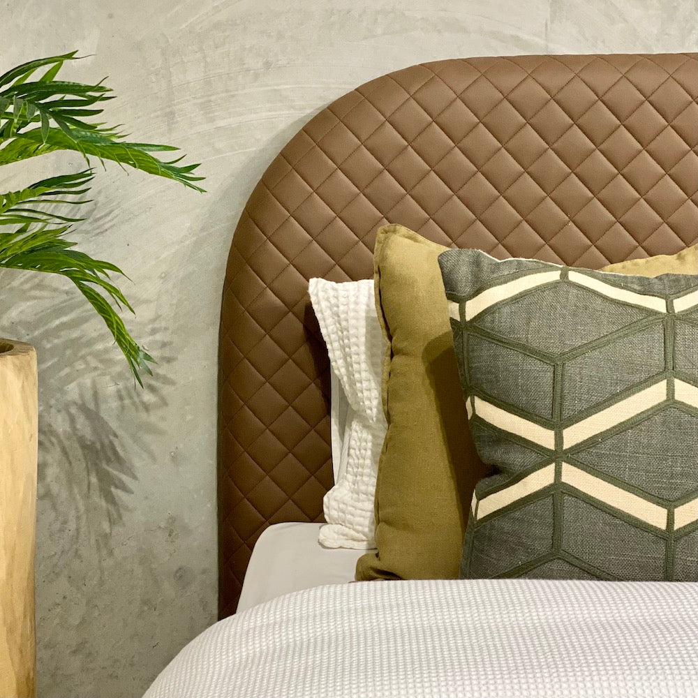 Benito Quilted Leather Upholstered Bedhead