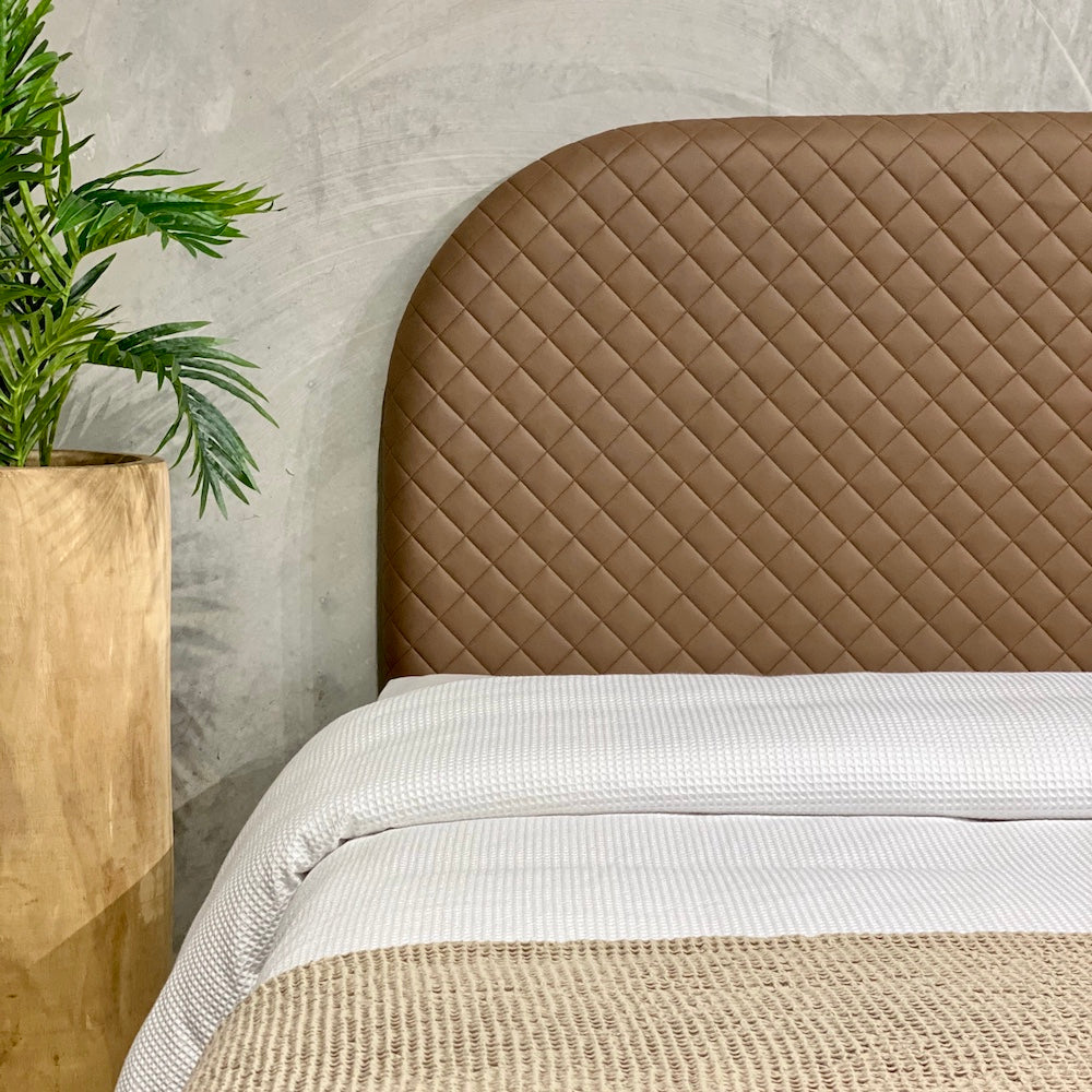 Benito Quilted Leather Upholstered Bedhead