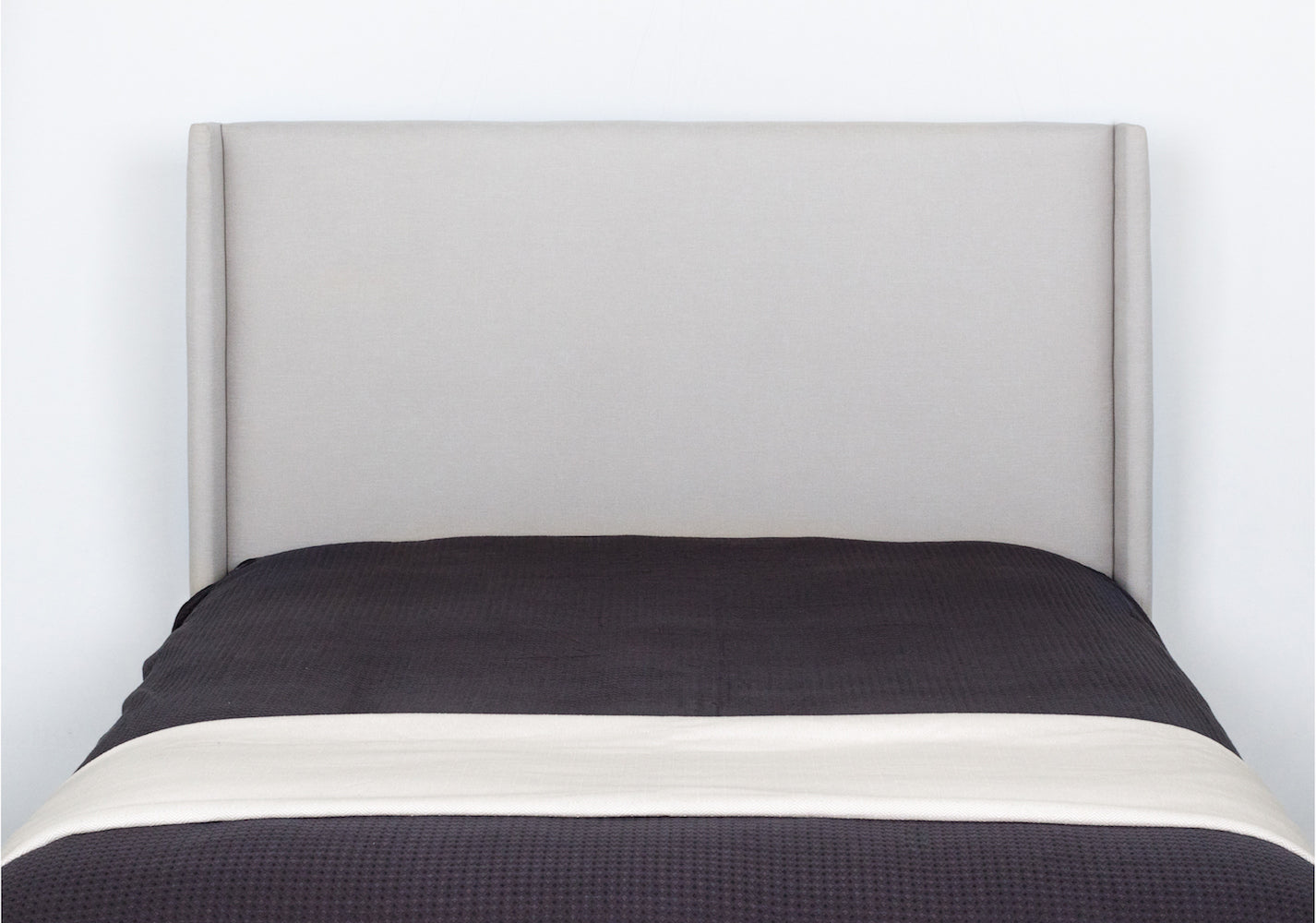 The Bay Winged Linen Upholstered Bedhead