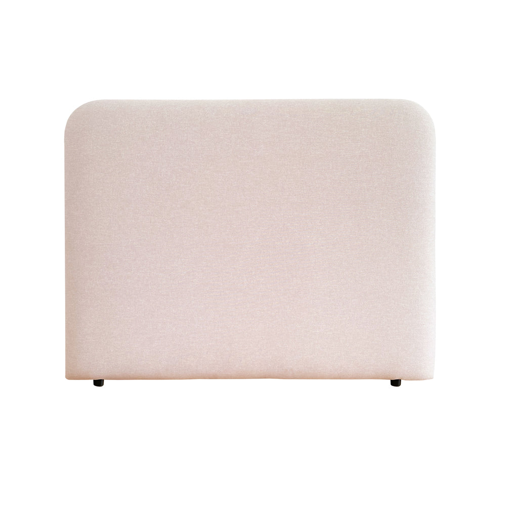 Beige upholstered headboard on a white background