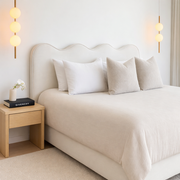 wavy heaboard, white, with white piping, in modern bedroom