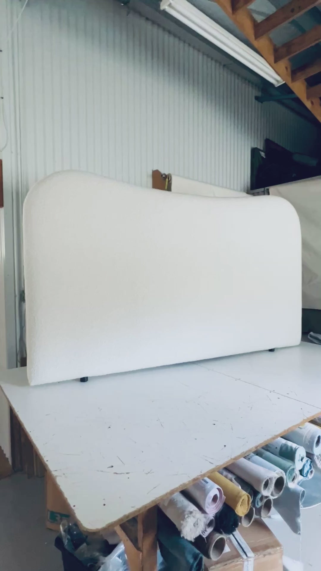 Load video: Ivory boucle Amara upholstered bedhead in the Hill Furnishings workshop