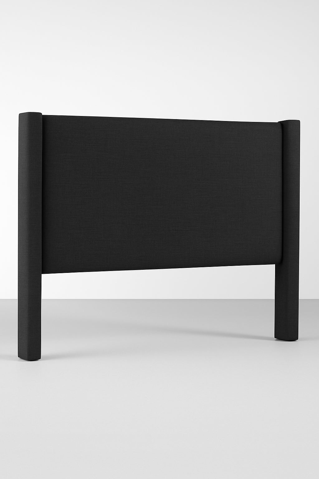 Handcrafted linen upholstered wingback bedhead in Bay design