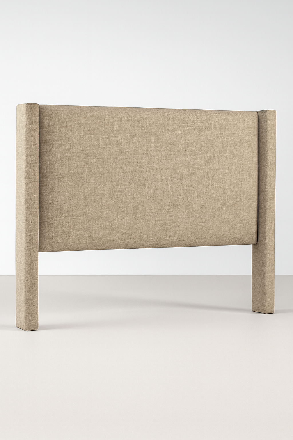 Bay Winged Bedhead with padded linen upholstery and tall wings