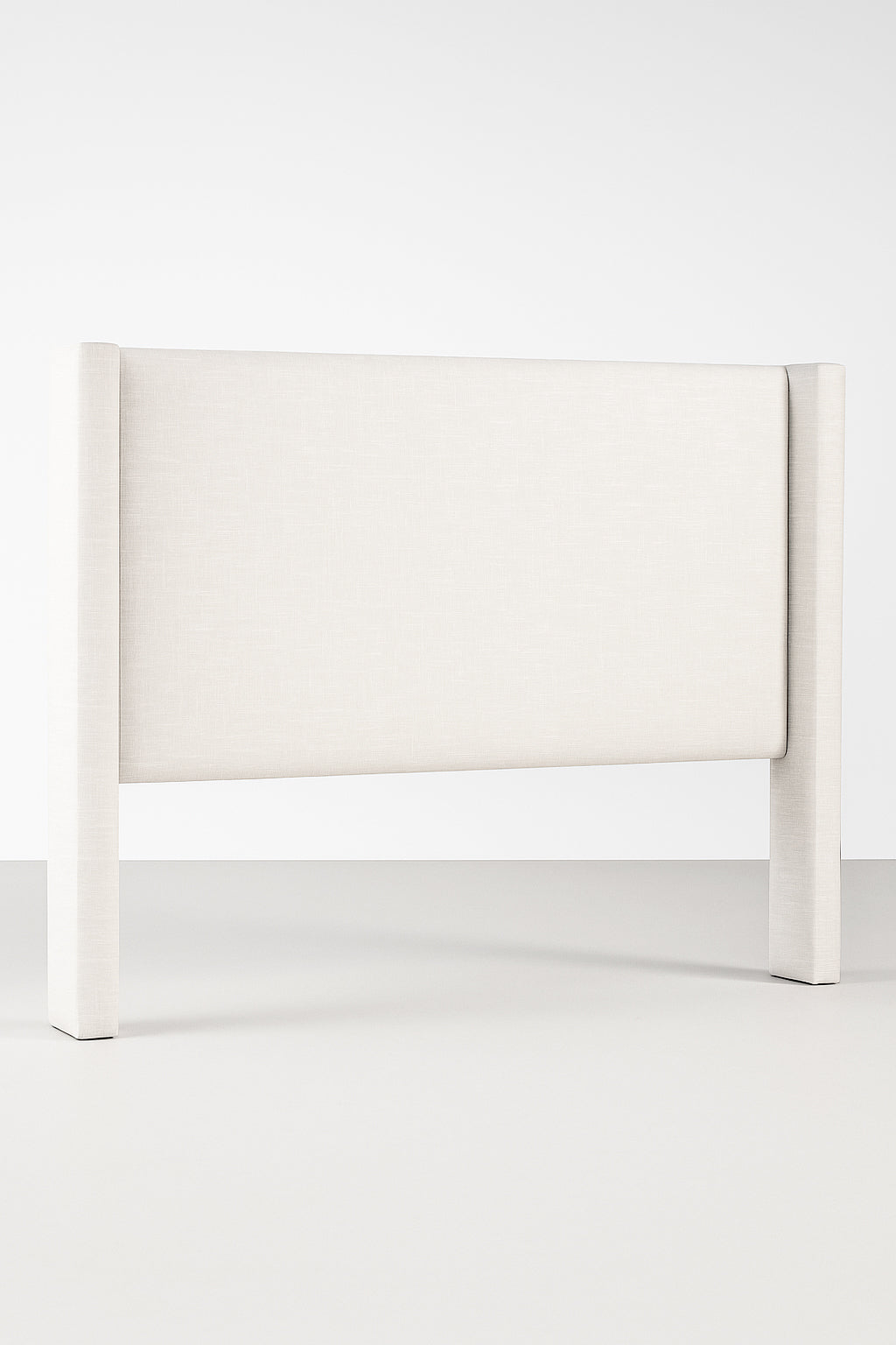 Modern wingback linen upholstered bedhead from Hill Furnishings